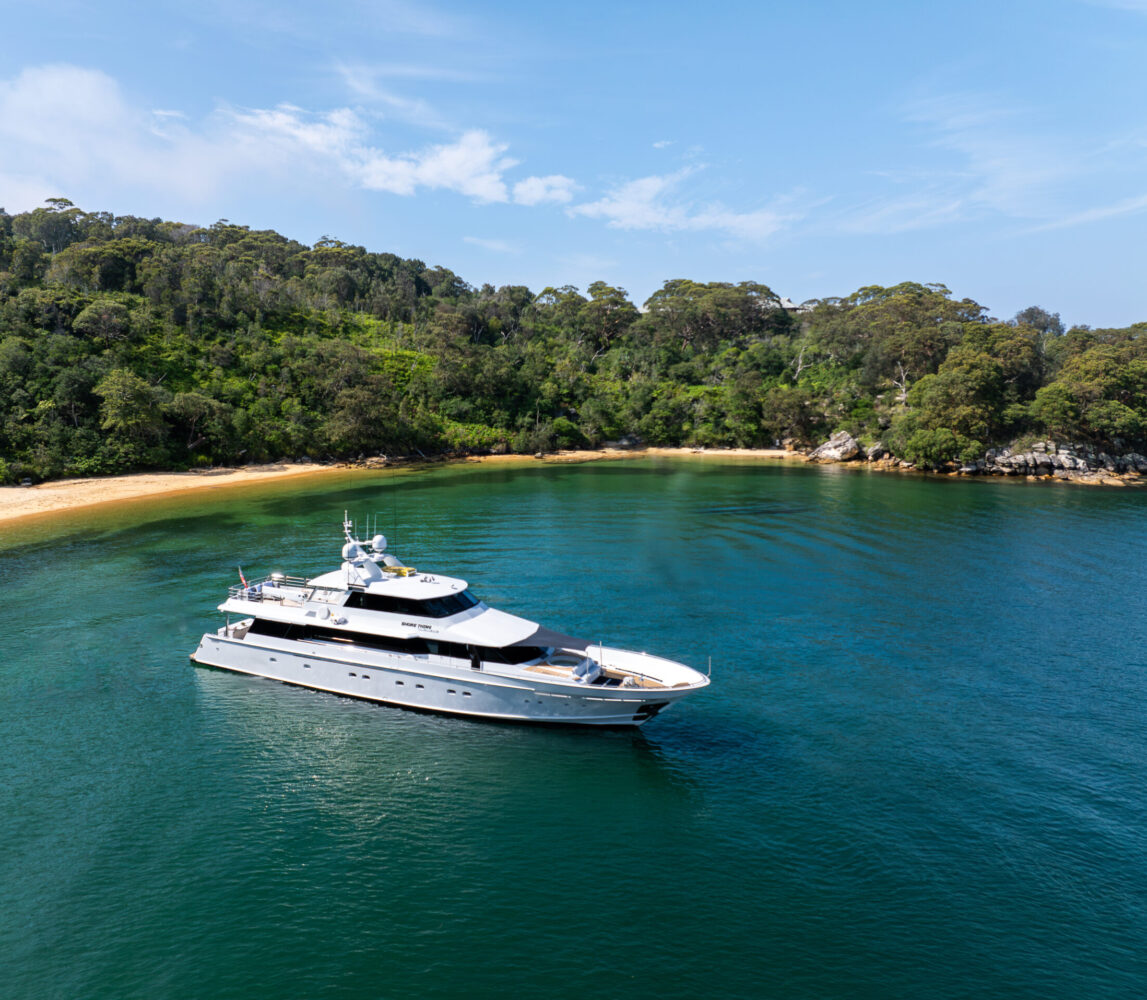 Shore Thing yacht in bay arial Shore Thing yacht in bay arial